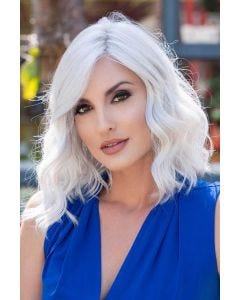 Woman in a shoulder length medium auburn curly lace front wig