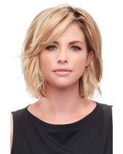 Woman in a 6" to 8" blonde hair topper for thinning hair