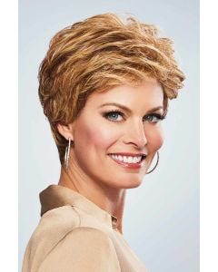 Woman in a warm blonde pixie wig with longer hair on the top and sides