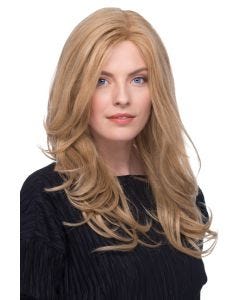 Woman in an extra long curly golden blonde layered remy human hair wig