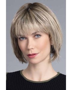 Woman in a 5.5" to 9.75" light brown hair topper for thinning hair