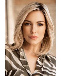 Woman in a past the shoulders light blonde straight lace front wig