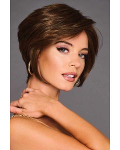 Woman in a chin length stacked, angled dark brown bob wig