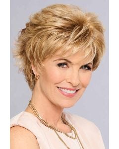 Woman in a short light auburn lace front wig with longer hair on top