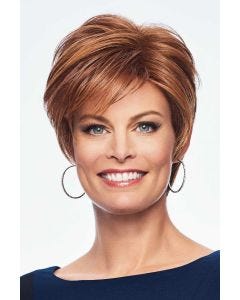 Woman in a medium auburn long pixie wig with side bangs