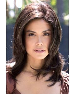 Woman in a past the shoulders dark brown wig with long layers