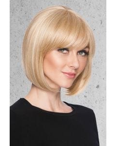 Woman in a 4.5" to 10.5" light blonde hair topper for thinning hair