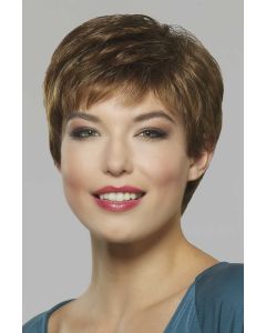 Woman in a short classic light brown pixie wig