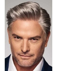 Man in a cropped light grey brushed back human hair wig with shorter sides