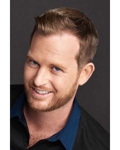 Man with a close cropped ash brown wig with long hair on top