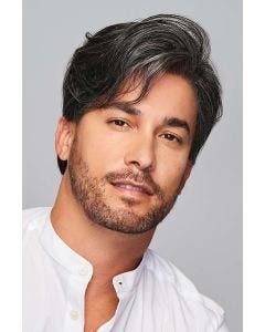 Man in a short salt and pepper lace front wig with longer layers on the top and sides