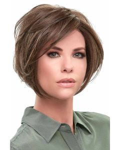 Woman in a large chin length medium brown angled lace front wig