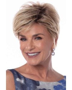 Short feathered pixie layers and side-swept bangs.