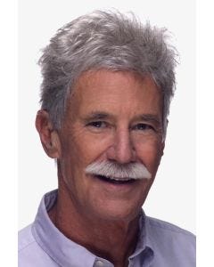 Older man in short, textured light grey toupee wig hairpiece