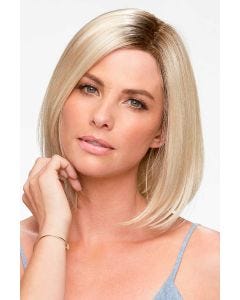 Woman in a petite shoulder length blunt cut light blonde wig