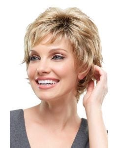 Woman in a long warm blonde pixie wig with short fringe bangs