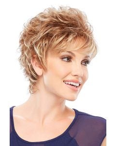 Woman in a curly auburn highlighted pixie wig with side swept bangs