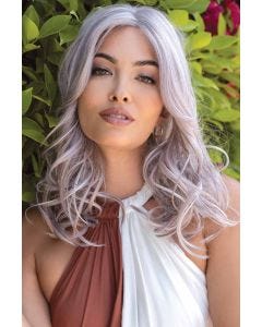 Woman in a past the shoulder curly light pink lace front wig