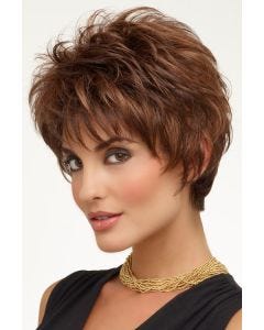 Woman in a medium auburn shaggy pixie wig with textured bangs