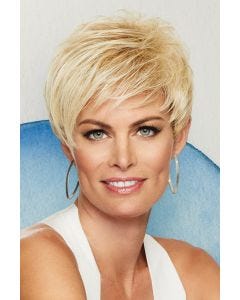 Woman in a light blonde asymmetrical pixie wig with side bangs