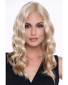 Woman in a past the shoulders wavy light blonde lace front wig