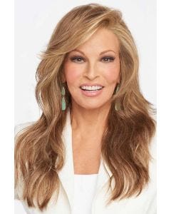 Raquel Welch in an extra long wavy light auburn wig with side bangs