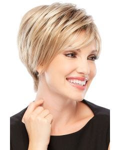 Woman in a petite asymmetric short blonde bob wig with side swept bangs and longer layers at the back
