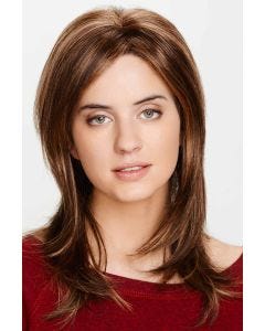 Woman in a past the shoulders long layered medium brown wig