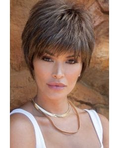 Woman in a brushed forward medium brown shaggy pixie wig with textured bangs