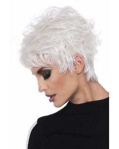 Woman in a messy, choppy layered white human hair wig with side bangs