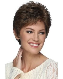 Woman in a petite evenly layered light golden brown lace front pixie wig
