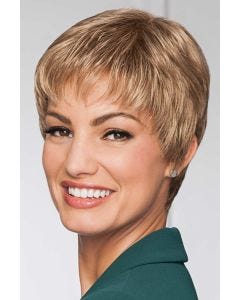 Woman in classic dark blonde straight pixie wig with fringe bangs