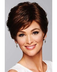 Woman in a medium length dark brown pixie wig with side bangs