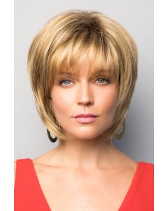 Woman in blonde short chin length bob wig with layers and bangs