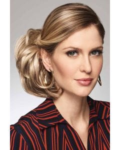 Woman in 5" to 6" light brown clip in hairpiece updo wig