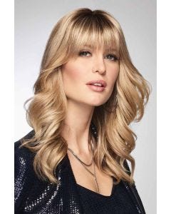 Woman in a 9.75" warm blonde hair topper with 6" fringe bangs