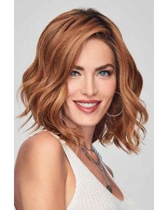Woman in a medium auburn angled curly lace front bob wig