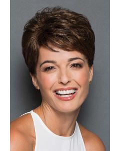 Woman in a dark brown hair topper with textured layered and side swept fringe bangs