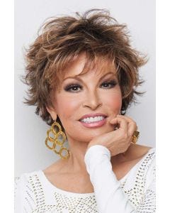 Raquel Welch in a tousled medium auburn pixie wig with fringe bangs