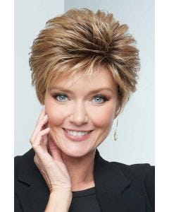Woman in a blown out light blonde lace front pixie wig with longer hair on top
