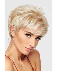 Woman in a long messy light blonde pixie wig with textured bangs