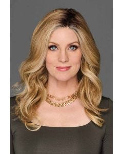 Woman in a 14" wavy blonde lace front hair topper for thinning hair