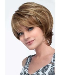 Woman in a short layered red blonde wig with side bangs