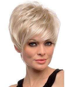Woman in an asymmetric brushed over platinum blonde bob wig with side bangs