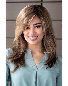 Woman in an extra long ash brown wig with long layers and curtain bangs