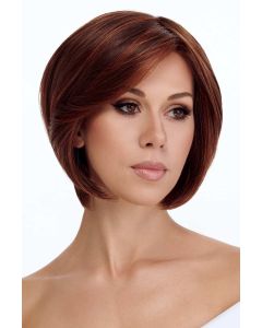 Woman in a chin length light blonde rounded bob wig
