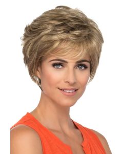 Woman in a long light brown lace front pixie wig with side bangs