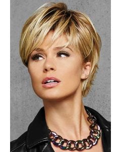 Woman in a long dark blonde pixie wig with textured spiky bangs