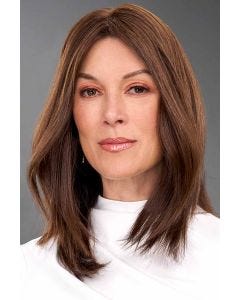 Woman in a 12" straight brown human hair topper for thinning hair