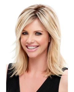 Woman in a light blonde 8" to 10" layered wiglet hair topper